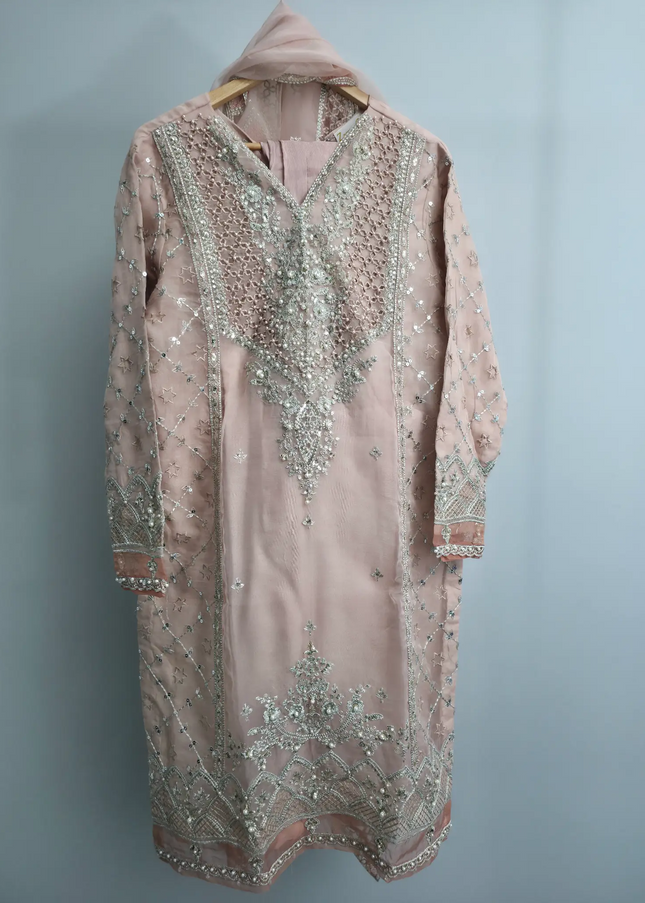 Peach pink 3-piece outfit with embroidered organza kurta, straight trousers, and organza dupatta for festive and party occasions