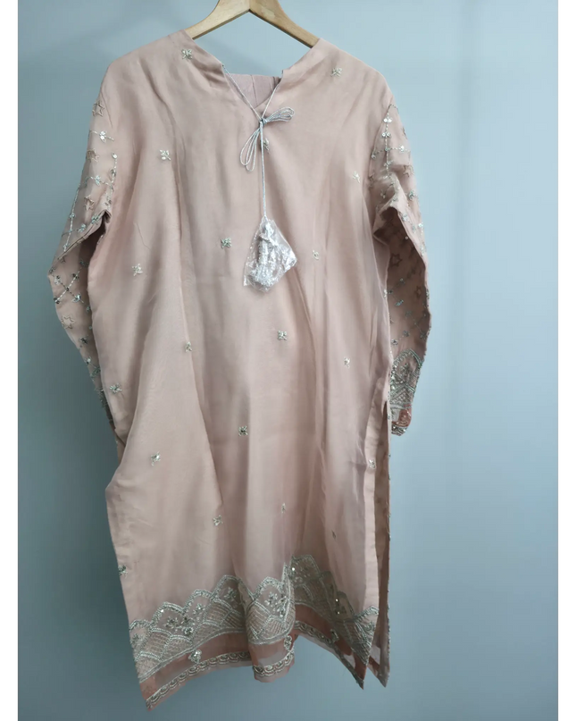 Peach pink 3-piece outfit with embroidered organza kurta, straight trousers, and organza dupatta for festive and party occasions